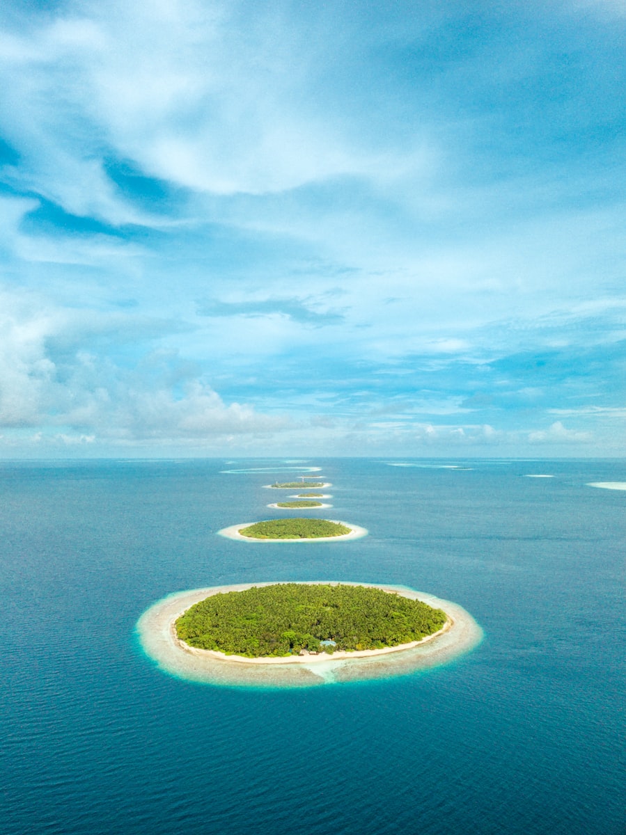 Turquoise lagoons surrounding islands in the Maldives